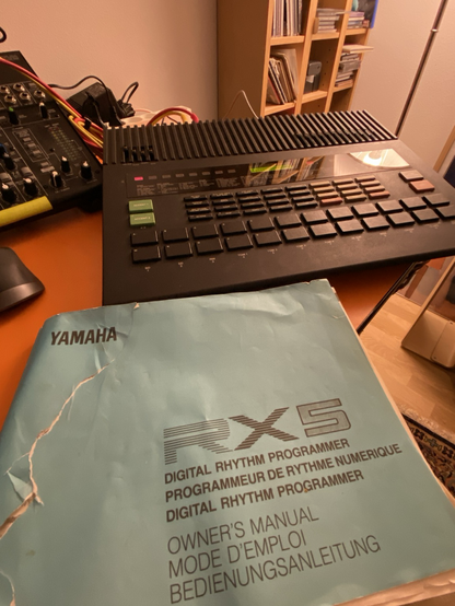 Photo of Yamaha RX5 and the manual.