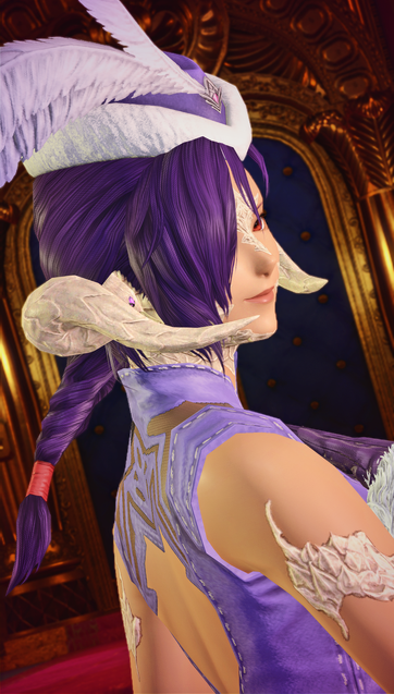 Close-up shot. She is doing a slight turn and on of her eyes is covered by her hair.