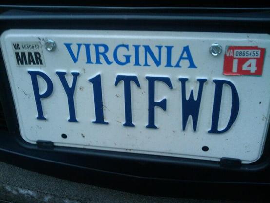 Photograph of a Virginia license plate "PY1TFWD" (pay it forward)