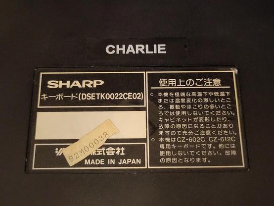 Changed my usual "CHARLIE" name tag on the bottom of the keyboard from black-on-white to white-on-black.

People often find if funny, that I label all my stuff with my name, but honestly, if you're involved in organizing as many events as I am, and you mix-and-match your gear a lot with stuff from others, and people misplace your stuff all the time or accidentally pack it with someone else's stuff, this is the best thing you can do to get it back...