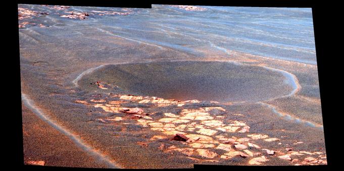 A false color rendering of a Martian crater.

Image credit: NASA/JPL/Cornell
   Image mosaicking:
     Elaina McCartney,
     Jon Beans Proton,
     Jonathan Joseph
   Calibration and color
   rendering: CCC
   and the Pancam team (Jim Bell) 