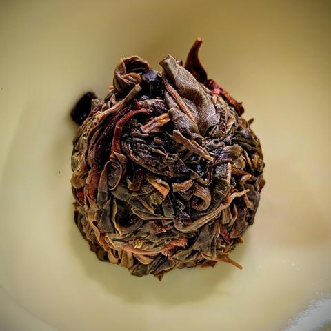 Damp ball of jingmai sheng puerh