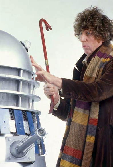 The 4th Doctor, Tom Baker, poses with a Dalek for a photoshoot.

You know, as much as I hate being old, I am so grateful that my personal time-stream lined up with this man's, and that my younger incarnation got to watch him in Doctor Who on Saturday nights back in the day.

Of course, today, you can stream those same episodes, mega-restored in ultra-high-def whatever, but honestly, I'd rather be watching at my Nan's house... sitting impatiently through the Grandstand teleprinter and Basil Brush's interminable jokes as I waited to accompany the greatest Time Lord of them all on another thrilling adventure.

Oh, and those delicious cliff-hangers endings... You knew it was coming, but when the theme-tune would come crashing in I'd feel it - physically - like I was being hit in the chest by a great tidal wave. I'd surf that wave through the weekend, only to be left washed up at school on a Monday morning and desperate for Saturday to come round again (and, boy, didn't the days just seem to crawl back then - I wish they did now).

Tom Baker's Doctor Who wasn't just a television programme, it was the wallpaper that covered the bedroom of my existence... or something... no, forget that, I'm getting a bit carried away now, sorry. However, it really was something truly special, and if you didn't get to experience Doctor Who at its peak then I feel sorry for you.

Happy Birthday, Mr Baker. Thanks for the memories.