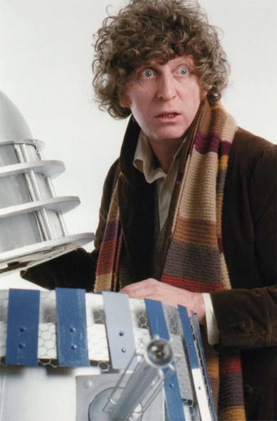 The 4th Doctor, Tom Baker, poses with a Dalek for a photoshoot.

You know, as much as I hate being old, I am so grateful that my personal time-stream lined up with this man's, and that my younger incarnation got to watch him in Doctor Who on Saturday nights back in the day.

Of course, today, you can stream those same episodes, mega-restored in ultra-high-def whatever, but honestly, I'd rather be watching at my Nan's house... sitting impatiently through the Grandstand teleprinter and Basil Brush's interminable jokes as I waited to accompany the greatest Time Lord of them all on another thrilling adventure.

Oh, and those delicious cliff-hangers endings... You knew it was coming, but when the theme-tune would come crashing in I'd feel it - physically - like I was being hit in the chest by a great tidal wave. I'd surf that wave through the weekend, only to be left washed up at school on a Monday morning and desperate for Saturday to come round again (and, boy, didn't the days just seem to crawl back then - I wish they did now).

Tom Baker's Doctor Who wasn't just a television programme, it was the wallpaper that covered the bedroom of my existence... or something... no, forget that, I'm getting a bit carried away now, sorry. However, it really was something truly special, and if you didn't get to experience Doctor Who at its peak then I feel sorry for you.

Happy Birthday, Mr Baker. Thanks for the memories.