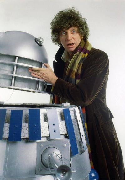 The 4th Doctor, Tom Baker, poses with a Dalek for a photoshoot.

You know, as much as I hate being old, I am so grateful that my personal time-stream lined up with this man's, and that my younger incarnation got to watch him in Doctor Who on Saturday nights back in the day.

Of course, today, you can stream those same episodes, mega-restored in ultra-high-def whatever, but honestly, I'd rather be watching at my Nan's house... sitting impatiently through the Grandstand teleprinter and Basil Brush's interminable jokes as I waited to accompany the greatest Time Lord of them all on another thrilling adventure.

Oh, and those delicious cliff-hangers endings... You knew it was coming, but when the theme-tune would come crashing in I'd feel it - physically - like I was being hit in the chest by a great tidal wave. I'd surf that wave through the weekend, only to be left washed up at school on a Monday morning and desperate for Saturday to come round again (and, boy, didn't the days just seem to crawl back then - I wish they did now).

Tom Baker's Doctor Who wasn't just a television programme, it was the wallpaper that covered the bedroom of my existence... or something... no, forget that, I'm getting a bit carried away now, sorry. However, it really was something truly special, and if you didn't get to experience Doctor Who at its peak then I feel sorry for you.

Happy Birthday, Mr Baker. Thanks for the memories.