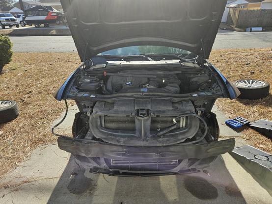 An e90 335i sans bumper, headlights, and fender liners