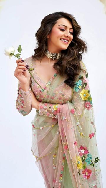 Pastels and florals never go out of style, and Hansika Motwani proves it in her stunning saree. This look is a true ode to spring, and it’s perfect for any special occasion.