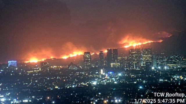 Fire raging above a city-scape