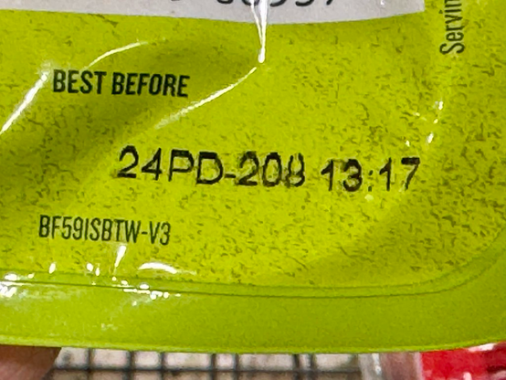 An unintelligible code appears printed on a product package as the “best by” date. The code is “24PD-208 13:17”