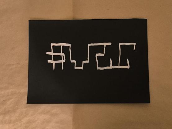 Graffiti tag that reads 'avec'. One-liner.