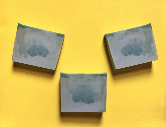 green soap on bright yellow backdrop