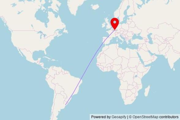 A map showing the great circle route from Montevideo in Uruguay to a map pin at Saints-Pierre-et-Paul, 31A Rue de l'Église, 4552 Differdange, Luxembourg