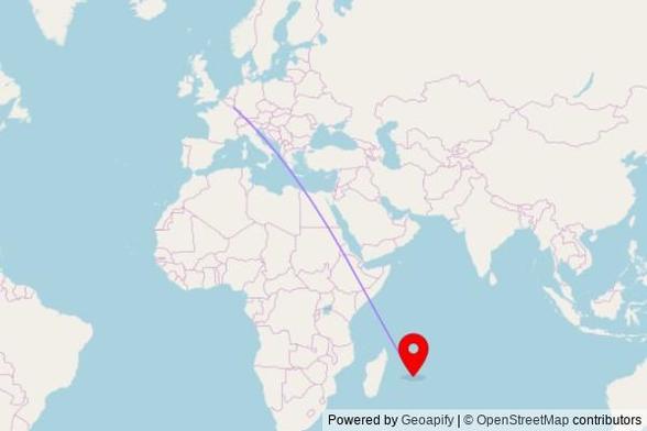 A map showing the great circle route from Differdange in Luxembourg to a map pin at Église Saint Léon Notre Dame De Valenkani, Ole Granport Road, Vuillemin, Mauritius