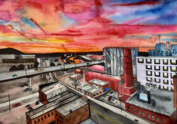 Red sunset over the Dakota Mill, Mankato, Minnesota. The mill has been closed down sadly but the city are trying to save the silo murals that are a landmark in the city. 