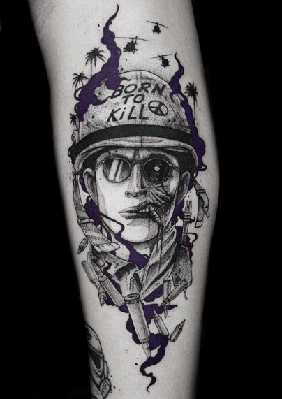 Pvt Joker portrait tattoo, character from Kubirik’s movie Full metal jacket. Soldier wearing a helmet with a ‘born to kill’ tag, chewing on a bullet, wearing glasses, half face normal half face horror. Helicopters and palm trees in the background. Bullets floating around the portrait and purple smoke that draws out some devil horns silhouette. 