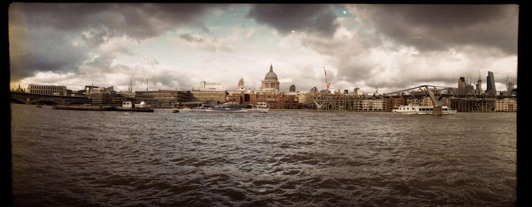 St Paul's Cathedral viewed from the opposite shore of the Thames river. Millennium bridge at the right side. London 2017