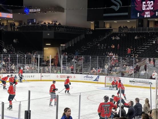 The Firebirds warm up for their game against the Condors in their Red Alert sweaters