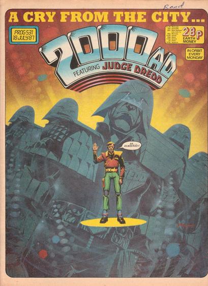 The front cover of 2000AD Prog 531 for 18 July 1987, featuring cover art by John Higgins showing a spotlit citizen of Mega-City One raising his hand whilst stating "er...democracy!" as behind him loom the massive stone-like statuesque figures of Judge Dredd and other judges beneath the banner "A cry from the city...", illustrating the Judge Dredd story Revolution.