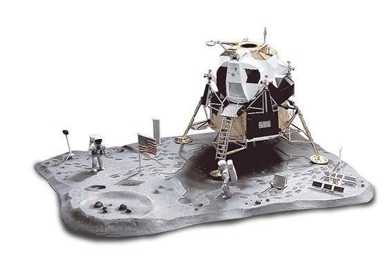 Assembled Monogram plastic model kit (originally from the 1960s, frequently reissued, maybe still today, not sure) with a Apollo lunar module on a diorama base, complete with craters and footprints for the two astronauts. Also included were reproductions of the instrument packages left on the Moon. The retroreflector on the middle-right is still useable today to bounce lasers that astronomer's telescopes can detect, and is used  to accurately measure the Moon's distance. I used one of the astronauts to scale my boxcar model.
(Photo borrowed via MonstersInMotion.com)