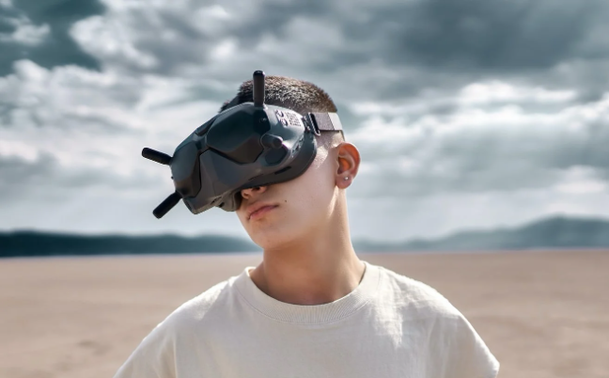 Young man wearing AR headset - illustrating a future where augment reality is a common everyday experience.