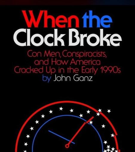 Cover art for book When The Clock Broke, by John Ganz.

The title appears at top in a sans-serif font (the word "when" is red, "the" is blue, and "Clock Broke" is white. The title tagline appears next in small red font. The author name appears next in white, proceeded by the word "by" in blue. 

The background is solid black. At bottom is an illustration of the top half of an analog clock, the hour hand is blue and the minute hand is red (it's tip is cracked and bent). The hands are roughly at the 10:05 position. The outer border-line of the clock is red and the inner border-line is blue.  Between the red and blue border-lines are white stars. They are evenly distributed from roughly the 9 to 12 position, after which they become disorganized, with some escaping the clock face and some piling up by the 3 position. It appears the outer red border-line is also cracked near the 3 position.