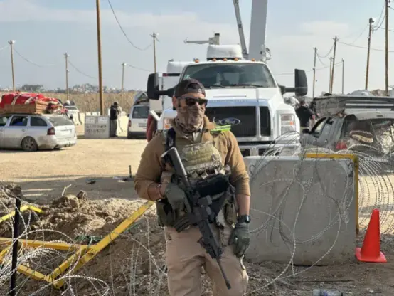 A private security contractor at the Netzarim Corridor in Gaza on January 28, 2025 [Doaa Albaz/Anadolu Agency]
