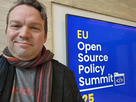 Me in front of the gate for the summit.