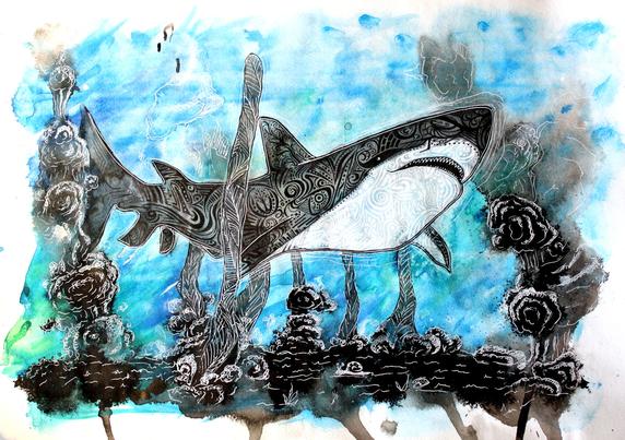 Under the sea oicture of shark that seems to be full of tribal tattoos.