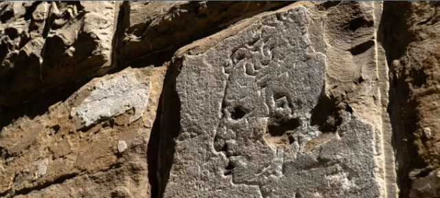 Picture of ancient petroglyphs, illustrating the point that time travel and history are rarely congruent.