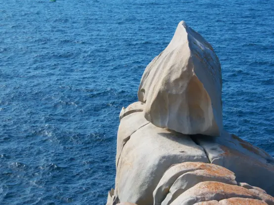 Light tafoni-type of weathering in granite. Punta Roncaidora, Galicia, Spain.