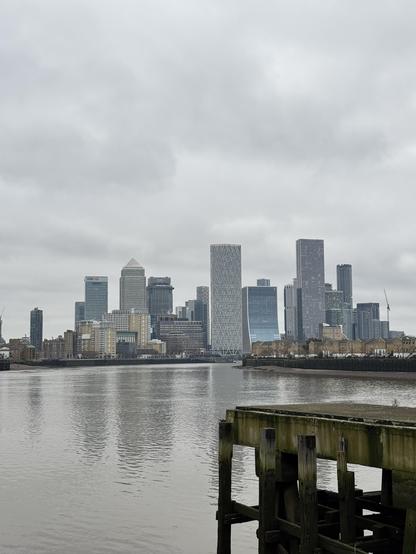 The Canary Wharf skyline, pictured from further west along the Thames path. 