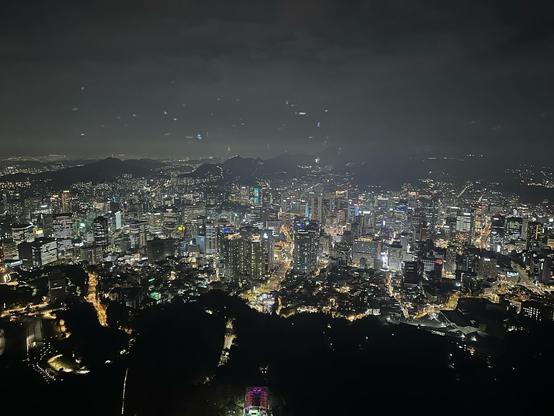 View of Seoul at night from the top of N Seoul Tower