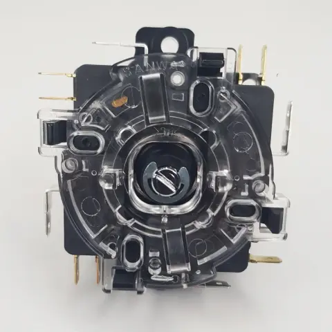The bottom of a joystick. The movement is restricted by a plate with a hole, whose shape defines if more than one switch can be pressed at once (diagonal input).

The restrictor plate can also be used to provide tactile feedback to the user. There are several shapes: square, octogonal, round, and variations thereof.

Image from: random Google search results.