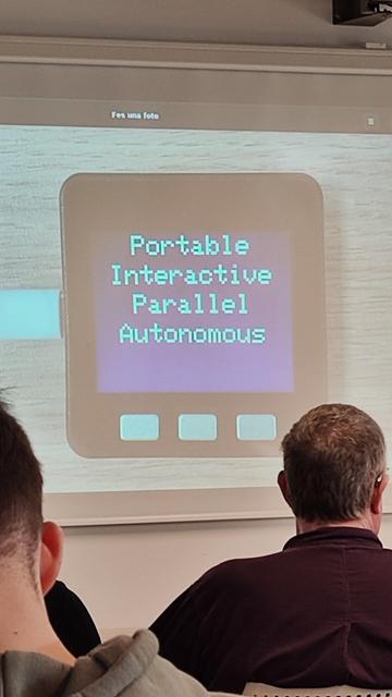 A screenshot a tiny screen showing the words Portable Interactive Parallel Autonomous