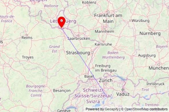 A map showing the great circle route from Erstfeld in Switzerland to a map pin at Saint-Martin, Rue de Hédange, 3812 Schifflange, Luxembourg