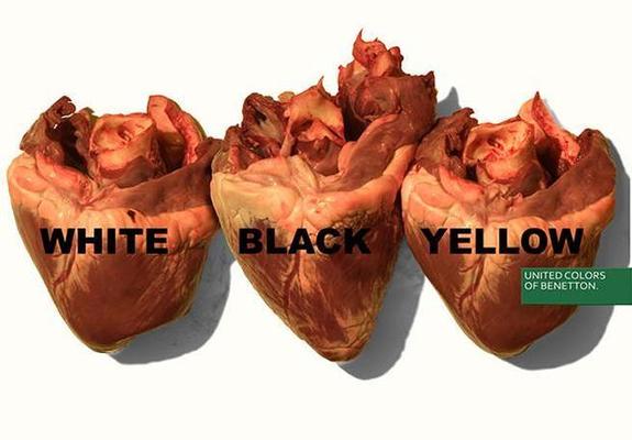 Three human hearts whith label "Black" "white" "yellow'
