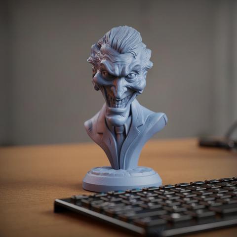 A highly detailed 3D-rendered digital sculpt of a Joker bust, designed for 3D printing in STL format. The bust captures the essence of the iconic villain with exaggerated facial features, including a wide, sinister grin, deep wrinkles, and expressive, piercing eyes. His wild, slicked-back hair adds to his chaotic persona, sculpted with intricate strands and layered volume for a lifelike effect. The character’s face is carefully textured with fine details, such as laughter lines, creases on his forehead, and subtle imperfections, enhancing realism.