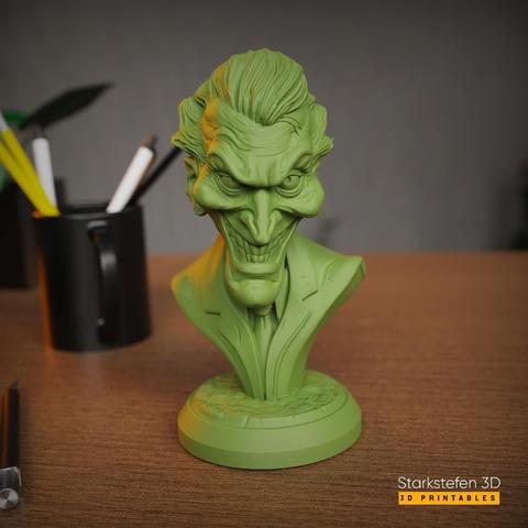 A highly detailed 3D-rendered digital sculpt of a Joker bust, designed for 3D printing in STL format. The bust captures the essence of the iconic villain with exaggerated facial features, including a wide, sinister grin, deep wrinkles, and expressive, piercing eyes. His wild, slicked-back hair adds to his chaotic persona, sculpted with intricate strands and layered volume for a lifelike effect. The character’s face is carefully textured with fine details, such as laughter lines, creases on his forehead, and subtle imperfections, enhancing realism.