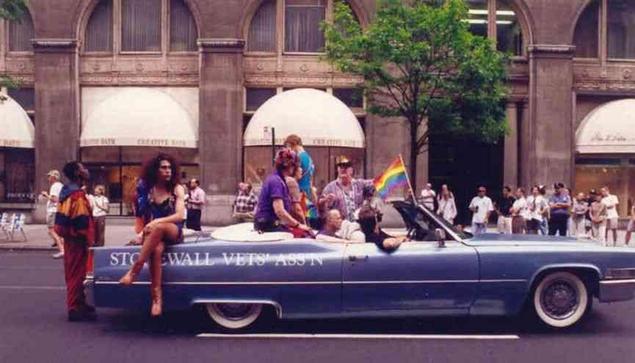 Sitting atop the back seat is S.V.A. Ambassador Storme DeLarverie and S.V.A. Executive Committee member Yvonne Ritter.  Shown directly sitting in the center of the famous "Stonewall Car" is S.V.A. member Tommy Lanigan Schmidt.  Riding shotgun is S.V.A. Executive Committee member R. Wayne Herndon.   