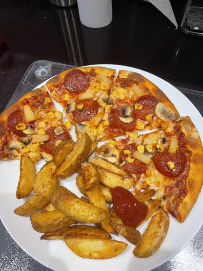 Four slices of pizza with pepperoni, pineapple, mushrooms, and sweetcorn plus a portion of potato wedges on a white plate. 