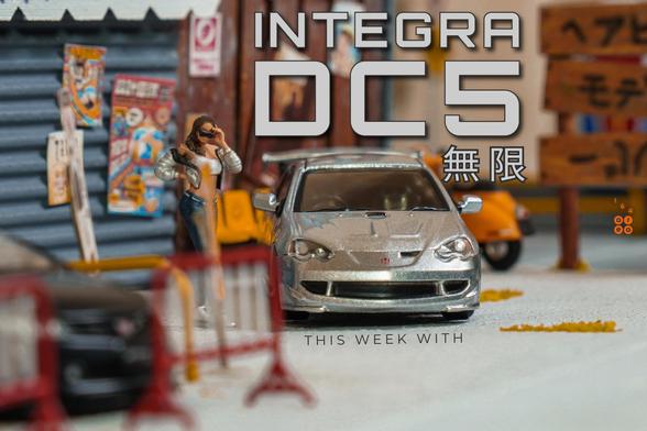 A Honda Integra Type R DC5 Mugen, Silver by Tarmac Works in 1:64 scale with 1:64 figure on AREA 164