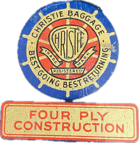 Round label in blue, gold and red. Over a ship’s wheel is a crest saying Christie and around it Christie Baggage, best going, best returning. 