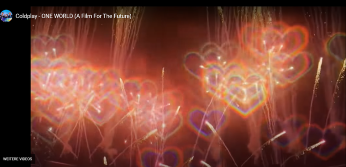 Februar 2025 Screenshot aus dem Musikvideo von Coldplay - Ein Film für die Zukunft 
viele kleine Herzen im Lichterschein selbst aus leuchtendem, buntem Licht - ein Funkeln und Glänzen in rot gelb und orange Tönen - Licht - Herzen #Lichtherzen https://youtu.be/5WCymVvjYjM