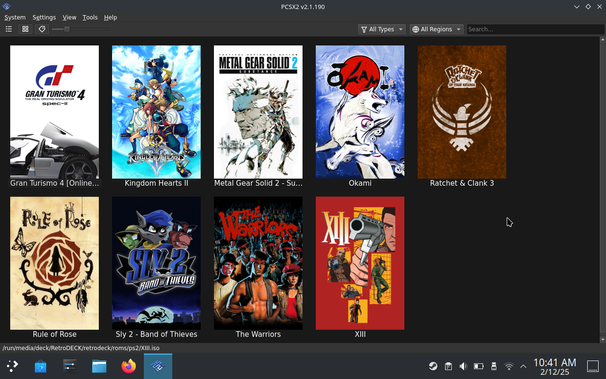 Picture of the PS2 emulator PCSX2. It shows 9 game covers on two lines. 5 up top and 4 below. Games include Gran Turismo, Kingdom Hearts II, MGS 2, Okami, Ratchet & Clank 3, Rule of Rose, Sly , The Warriors and XIII. 

Images are all in an upright rectangle orientation and all full color. 