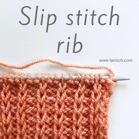 A swatch in salmon pink yarn on a gray knitting needle, showing the slip stitch rin stitch pattern.