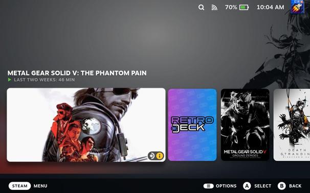 Showing the home screen of the Steam Deck with a large, horizontal rectangle showing the cover art of Metal Gear Solid V. Then small vertical rectangles showing RetroDECK, Metal Gear Solid V: Ground Zeroes and Death Stranding