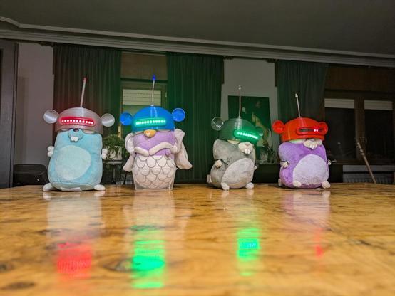 4 Gopherbots robotic gophers sitting on a table.