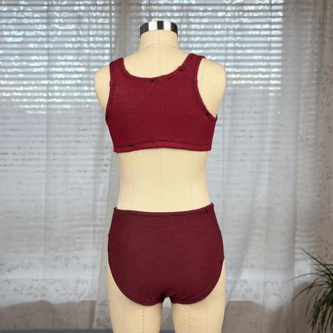 Sportsbra and panties on a dressform, seen from the back.