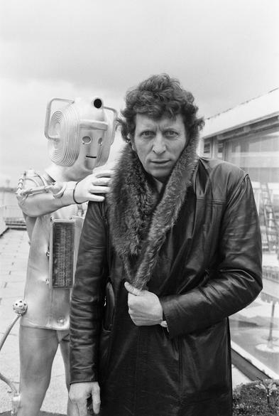 Friday, 15th February, 1974: Tom Baker is menaced by a Cyberman outside the BBC Television Centre restaurant as the new Doctor is introduced to the press.