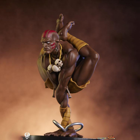 the statue of dhalsim, seen from the right side 